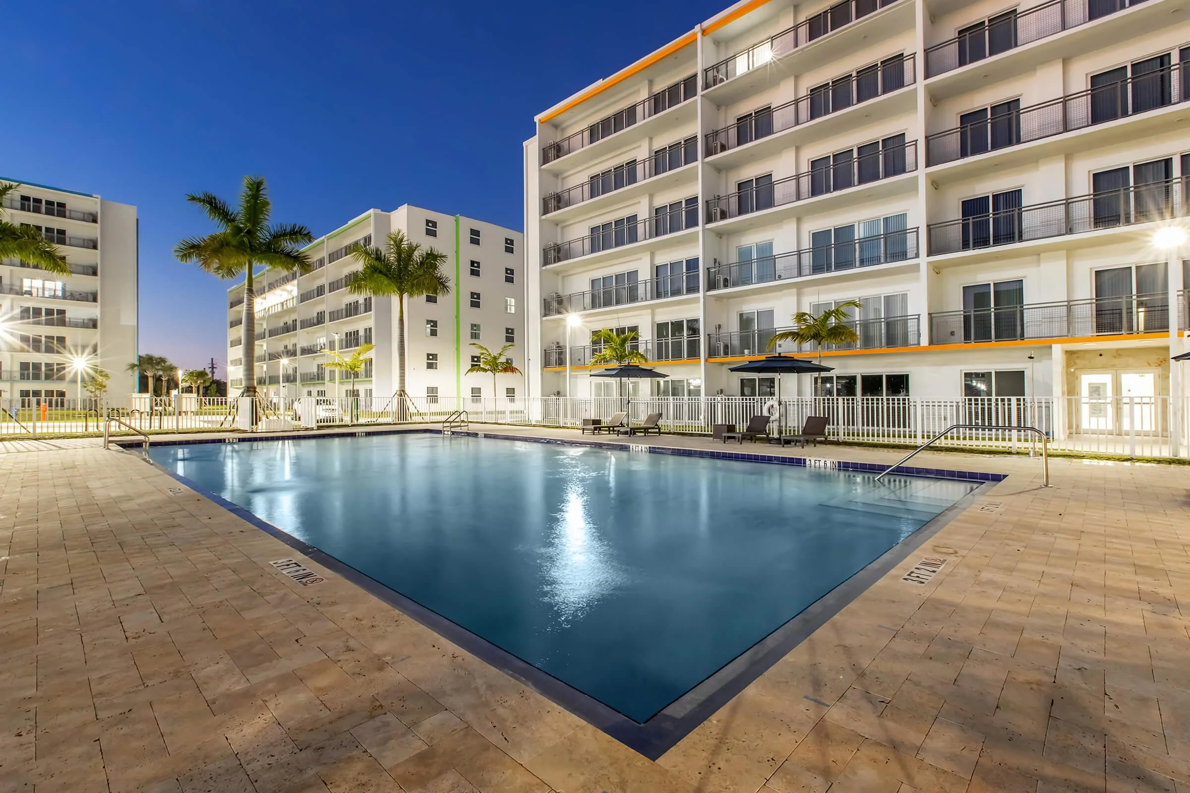 Pool and landscaped outdoor amenities at Modern Towers